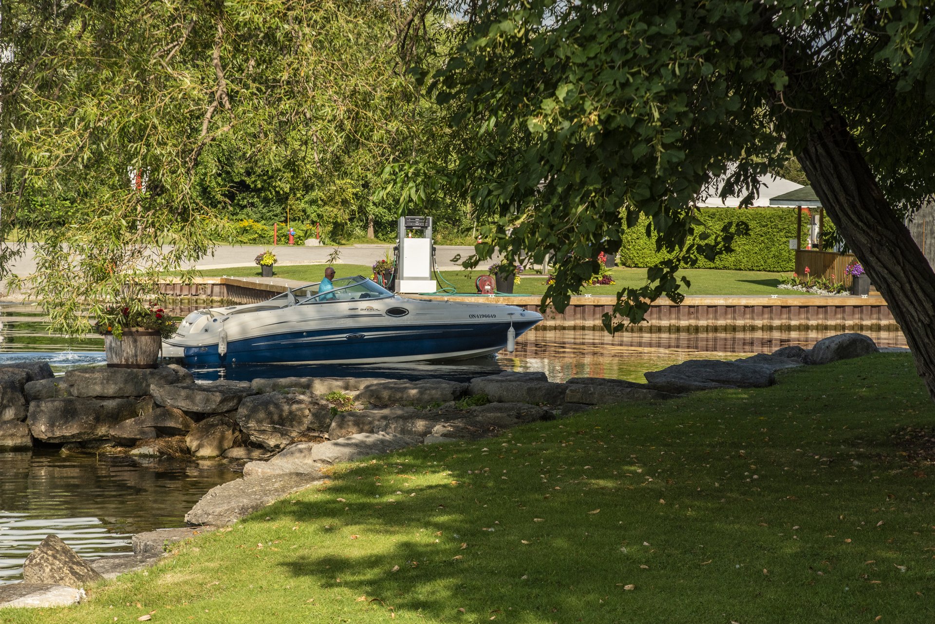 Ojibway Bay Marina in Rama First Nation with boat coming in to the marina