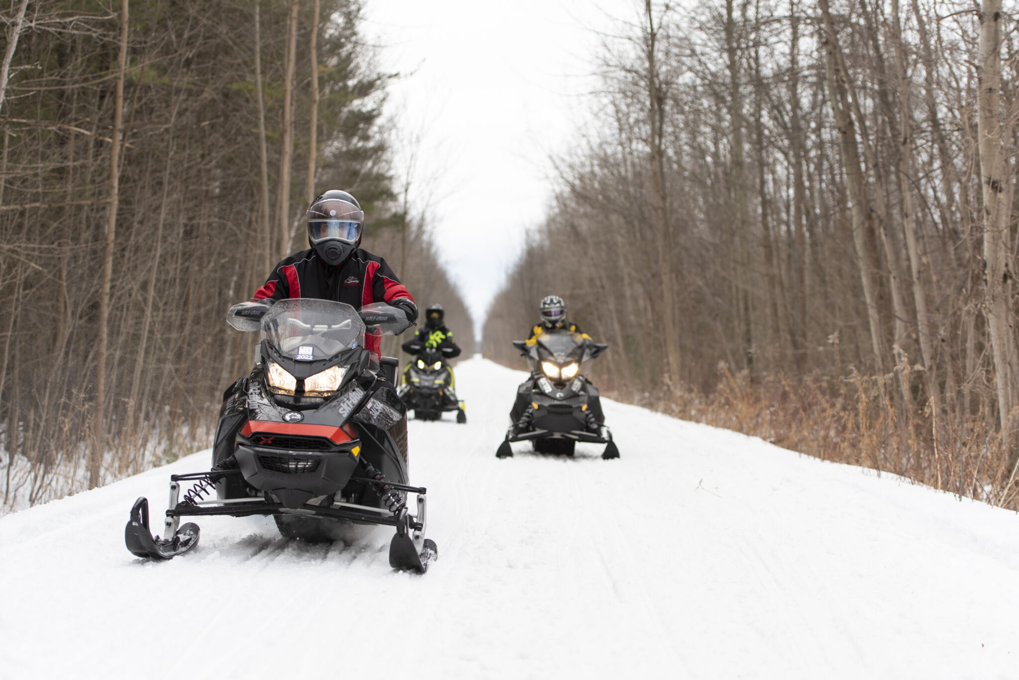 Snowmobilers on the trails with SMART Adventures in Oro Medonte