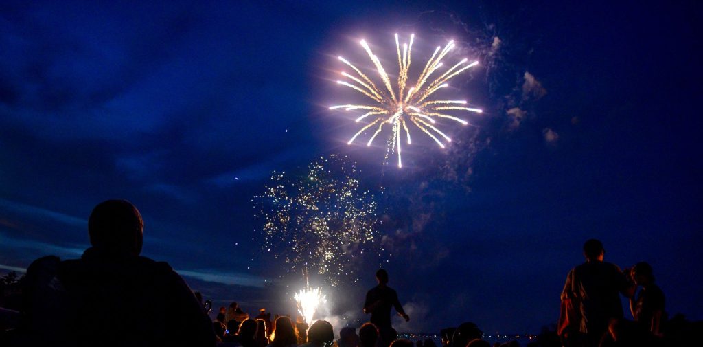 Fireworks over Lake Couchiching at night