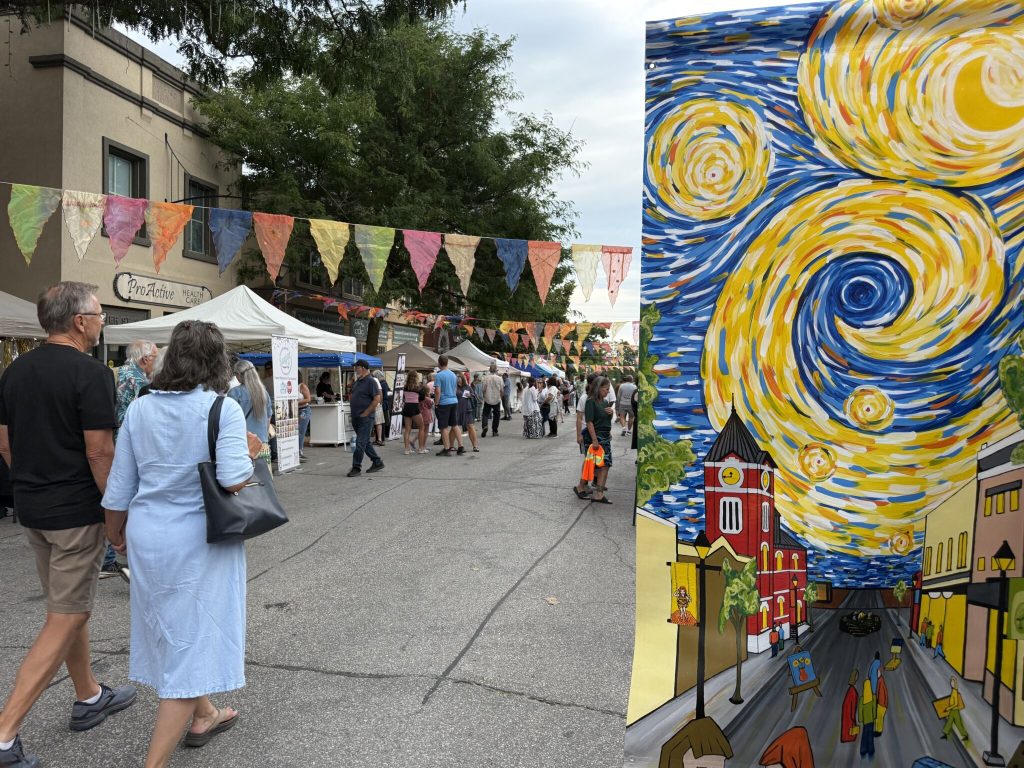 Visitors viewing outdoor artwork during Starry Night in downtown Orillia